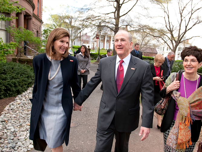 Dr. Barchi walks across the Old Queens Campus with his wife, Francis Harper Barchi